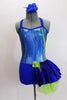 Iridescent blue/silver/green swirled metallic halter style unitard has blue bottom with attached skirt on left hip. Comes with matching blue hair accessory. Front