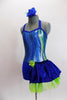 Iridescent blue/silver/green swirled metallic halter style unitard has blue bottom with attached skirt on left hip. Comes with matching blue hair accessory. Side