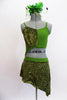 Green and olive two piece dress is attached at the hip. The bottom has a sheer sequined skirt and accented on the half-top. Comes with a matching green feather hair accessory. Front