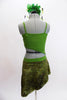 Green and olive two piece dress is attached at the hip. The bottom has a sheer sequined skirt and accented on the half-top. Comes with a matching green feather hair accessory. Back
