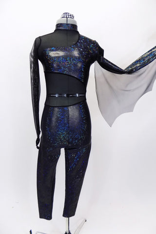 Black and blue iridescent full unitard has high collar enclosed with sheer black mesh at top & side. Has sheer attached bat-wing on left arm. Front