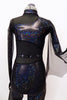 Black and blue iridescent full unitard has high collar enclosed with sheer black mesh at top & side. Has sheer attached bat-wing on left arm. Front Zoom
