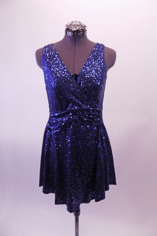 Simple but stunning royal blue fully sequined cross-front dress has gathered waist and low scoop back. Comes with a hair accessory. Front
