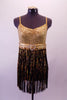 Gold and black flapper-style dress has gold swirl sequined base. The gold and black fringe skirt extends from a thick sequined band and gold belt with crystal heart belt buckle. Comes with a gold hair accessory. Front