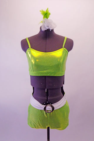 Lime green metallic two-piece costume is a camisole style tank top with princess cut. The matching bootie shorts has an attached white belt with silver oval buckle accent. Comes with a floral hair accessory. Front