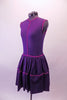 Purple knee-length traditional dress has a magenta band accents at the binding and gathered full skirt. The fully lined dress falls nicely as it moves. Side