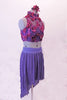 Periwinkle finely pleated chiffon, knee-length high-low skirt has a wide waistband. The high neck half-top has a periwinkle base with a purple sheer that is adorned with sild roses in shades of pinks, purples and deep berry. Comes with deep berry coloured floral hair accessory. Side