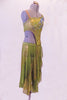 Bohemian inspired gold & olive dress has an asymmetric, single shoulder, gold hashed half-top covered in a cascade of blue-green & AB crystals. The front of the bra top extend down the torso slightly to the left & attached at the crystal-covered waistband. The asymmetric kerchief skirt is random panels of olive & gold. Right side
