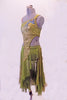Bohemian inspired gold & olive dress has an asymmetric, single shoulder, gold hashed half-top covered in a cascade of blue-green & AB crystals. The front of the bra top extend down the torso slightly to the left & attached at the crystal-covered waistband. The asymmetric kerchief skirt is random panels of olive & gold. Left side