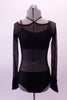Simple but bold sheer black leotard with sold bottom has a unique halter-like crystalled band originating from the piping of the wide neckline the scoops at the back. A black bra top with crystalled straps sits beneath the sheer leotard. Comes with a crystal hair accessory. Front