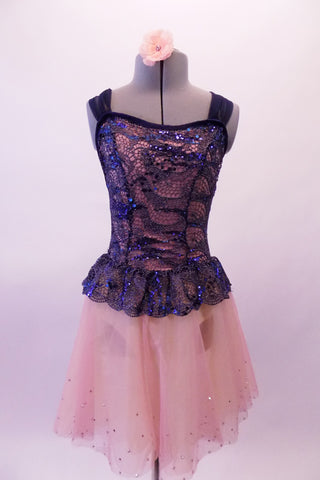 Dress has navy blue lace peplum bodice with blush liner. The layered blush chiffon knee-length skirt has a wide band of scattered crystals along the edge. The unique back has an elastic criss-cross pattern and a navy chiffon scarf originating from the shoulders which sheaths & mimics the elastic & ties at the back. Front