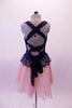 Dress has navy blue lace peplum bodice with blush liner. The layered blush chiffon knee-length skirt has a wide band of scattered crystals along the edge. The unique back has an elastic criss-cross pattern and a navy chiffon scarf originating from the shoulders which sheaths & mimics the elastic & ties at the back. Back