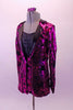 Fuchsia coloured full sequined blazer has a black star pattern and satin lapels. The blazer sits over the top of a simple black short unitard with gathered bust and camisole straps. Comes with matching hair barrette. Side