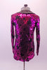 Fuchsia coloured full sequined blazer has a black star pattern and satin lapels. The blazer sits over the top of a simple black short unitard with gathered bust and camisole straps. Comes with matching hair barrette. Back