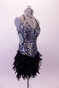 Flapper style dress has a feather skirt bottom attached to a fully sequined bodice. The deep plunge sweetheart bustline has two small centre bands. The back is fully open with a series of criss-cross tie-up straps that hold the entire front & sides together. Comes with crystal choker, long gloves & hair accessory. Side