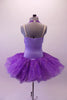 Purple tutu has more contemporary styling with a halter overlay neck on the camisole bodice with large crystal Brooch accent. The wide gathered cummerbund waistband, front -halter & skirt of the dress are sheer poly-chiffon with streaks of silver dot veining. The back of the bodice is pale lavender. Back