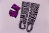 Zebra print stirrup stockings and purple sequined gauntlets.
