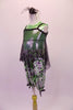 Metallic lime green tank is paired with silver black and green balloon capris. A large hole-mesh tunic-style tank rests over the top of the green tank. Comes with a hair accessory. Side