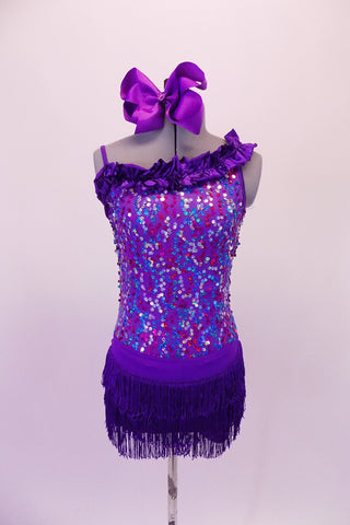 Purple sequined camisole short-tard has angled ruffle accent at front bustline. The short accent skirt is made of double-layered purple fringe for a sassy effect. Comes with a large bow hair accessory. Front