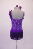 Purple sequined camisole short-tard has angled ruffle accent at front bustline. The short accent skirt is made of double-layered purple fringe for a sassy effect. Comes with a large bow hair accessory. Back