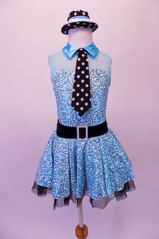Pale blue sequined dress has a sweetheart collar with a sheer blue mesh upper. The satin collar has an attached back & white polka dot tie. The black jewelled buckle belt & black petticoat tie together the black accents. The dress is complete with a miniature black & white polka dot hat and polka dot gauntlets. Front