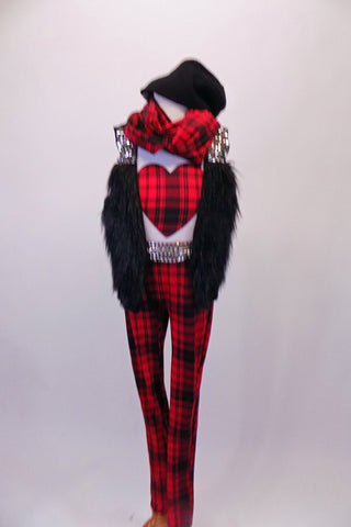 White tank top with red and black plaid heart is accompanied by matching plaid pants and sequined studded belt. A black furry vest with sequined shoulder sits over the white tank. The costume is completed by a matching plaid unity scarf and a black toque. Front