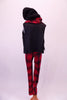 White tank top with red and black plaid heart is accompanied by matching plaid pants and sequined studded belt. A black furry vest with sequined shoulder sits over the white tank. The costume is completed by a matching plaid unity scarf and a black toque. Back
