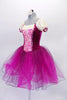 Magenta velvet tutu dress has pink lace centre and peasant-style blouse beneath lined with sequins. The layers of fuchsia and magenta tulle create a soft flowing skirt. Comes with lace butterfly hair accessory. Side