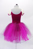 Magenta velvet tutu dress has pink lace centre and peasant-style blouse beneath lined with sequins. The layers of fuchsia and magenta tulle create a soft flowing skirt. Comes with lace butterfly hair accessory. Back
