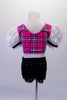 Bright pink tartan print half-top has white eyelet pouffe sleeves and white sequined centre accented with black ruffle. The accompanying booty short is fully fringed with crystal accents along the hip.  Comes with fringed black sequined pull-on boots/socks with elastic reinforced bottom. Back