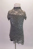 Grey camisole leotard sits beneath a grey sequined lace, mandarin collared cover dress with lace-up back. Though simple and sparkly, the costume has a forlorn style. Comes with a hair accessory. Front