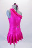 Bright fuchsia one shoulder leotard with a ruffled neckline is accompanied by a double layer ruffled skirt and matching shorts. Comes with a pull-on belt with crystal buckle accent and matching headband. Side