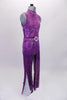 Fully sequined purple unitard with deep open back and tank-style front. The attached belt has a large crystal belt buckle for that extra bling. The pant legs are wide bottom for that 70s feel and have a glittery silver side insert (inseam 30”). Comes with a purple hair accessory. Side