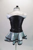 Three-piece, silver costume is comprised of a camisole leotard with a matching short double ruffled skirt with black piping. The accompanying zip front vest is a sequin print black with silver quilted shoulders. Comes with a hair accessory. Back