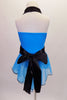 Turquoise, halter style top has princess seams and zip front. The delicate turquoise sheer double layered ruffle with black hem give the top a feminine flare. The wide satin ribbon belt ties at back. Can be paired with either black pants or shorts. Back