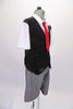 Newsboy themed costume is a black glitter vest and a white collared shirt with a red sequined tie. The top is actually an attached unit which pulls overhead as a single unit. This top is combined with grey knee-length shorts and a fine herringbone newsboy cap. Side