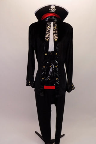 Fun, pirate-themed costume has a tunic style, long-sleeved, high collar top that zips at the back. The front has a leather-like panel as do the cuffs, with metal button accents. Black leggings complement the tunic top. A large pirate hat with skull and crossbones completes the look. 