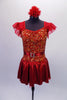 Red dress with a metallic skirt and ruffled ap sleeves has a fully sequined gold and red bodice that shimmers beautifully on stage. The jewelled belt adds extra pop. Comes with a red floral hair accessory. Front