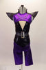 Black camisole top has a nude mesh insert with crystal accent and sequined belt. A purple metallic and sequined short shrug sits over top with pointy cone shoulders and chains. Matching purple knee-length pants accompany the top. Comes with a unique purple and black mask.  Front