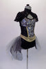 Black lace leotard has a high collar, pouffe sleeves & open back. The bodice has a peek-a-boo front opening &is  adorned with a silver jewelled steampunk pattern. The attached black & grey, open front tulle bustle skirt has scattered crystals. Comes with gold accented black felt bucket hat with a black ostrich feather. Right side