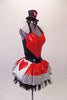 Halter style leotard dress has a large red heart front over a back base with ruffled organza collar. The attached skirt is shiny red with a black & white houndstooth edge over the top of black tulle. Two large white & red heart panels accent each of the hips. Comes with a mini black top hat with a heart accent.  Side