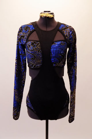Unique leotard has a figure 8 black front torso that crosses a bandeau-style bust of blue-black and gold floral stained glass pattern. The long-sleeved shrug is attached to the uniquely shaped black front that extends to form the neckline. Comes with a gold hair accessory. Front
