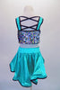 Unique costume has colourful upper composed of sequined panels attached to an aqua short circle skirt with stiffened edging, The back has double cross straps that extend between the shoulder blades. Comes with a floral hair accessory. Back