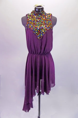 Purple lyrical dress has a jewelled front bust panel and elastic gathered waist. The knee-length skirt is longer along the right side like a sarong. The open keyhole back reveals the bandeau bra underneath. Comes with a hair accessory. Front