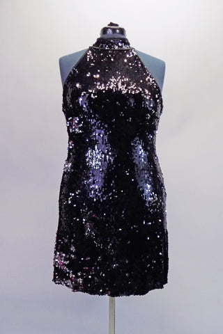 Fosse inspired black sequined short dress has a halter style collar. The back has a keyhole opening within the wide-angled back straps. Front