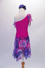 Lovely one-shouldered dress has a fuchsia leotard base with chiffon neck ruffle is shades of blue purple and fuchsia. The attached matching chiffon, knee-length skirt is light and flowy for a nice effect. The pop comes from a gorgeous crystal accessory at the waist. Comes with a large blue floral hair accessory. Back