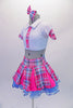 School uniform themed  2-piece costume comes with a wide pleated pink & blue tartan skirt with a wide waistband & bright pink inner pleats. The matching white half top has collar, buttons & cap sleeves with AB crystals and tartan accents. Comes with a large tartan bow hair accessory & purple gauntlets. Side