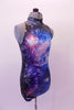 Halter style leotard with high collar and keyhole back has a galactic print with the cosmos in shades of blues and purples. Right side