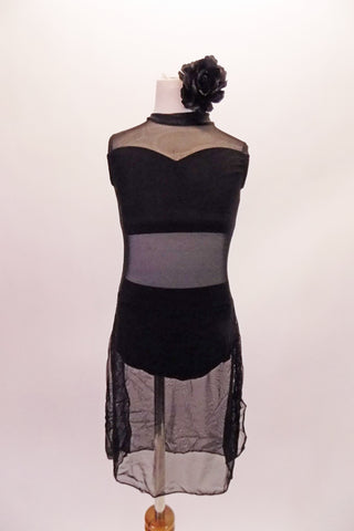 Sheer mesh, knee-length dress has an attached sweetheart cut half-top with nude lining at the upper bust. The dress has a keyhole back and clips at the neck. Comes with a black floral hair accessory. Front