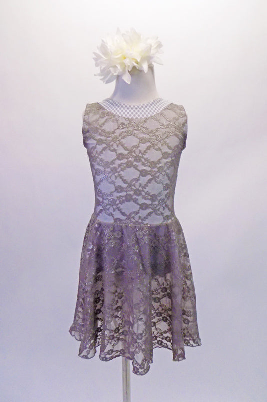 Silver lace, lined, tank-style dress has a pretty white and grey polka dot accent at the neck that extents as a sash/tie to close the keyhole opening at the base of the neck. Comes with a large white floral hair accessory. Front